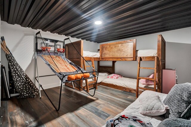 bedroom featuring dark wood-type flooring