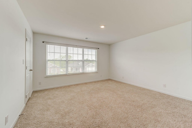 view of carpeted spare room