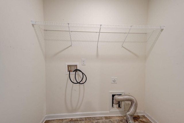 laundry area featuring electric dryer hookup and washer hookup