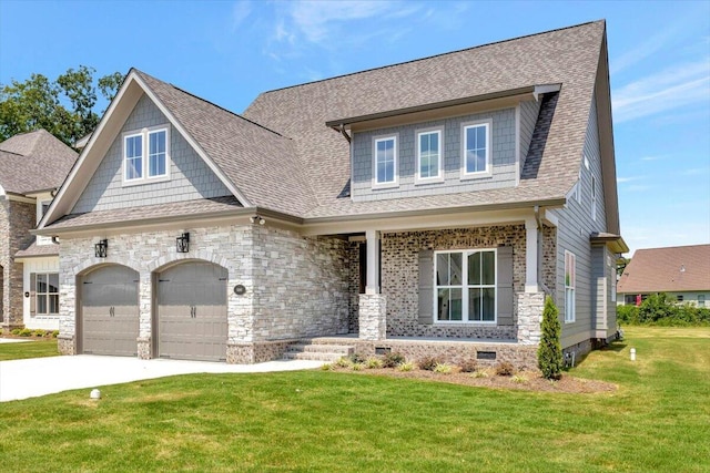 craftsman-style house with a front yard and a garage