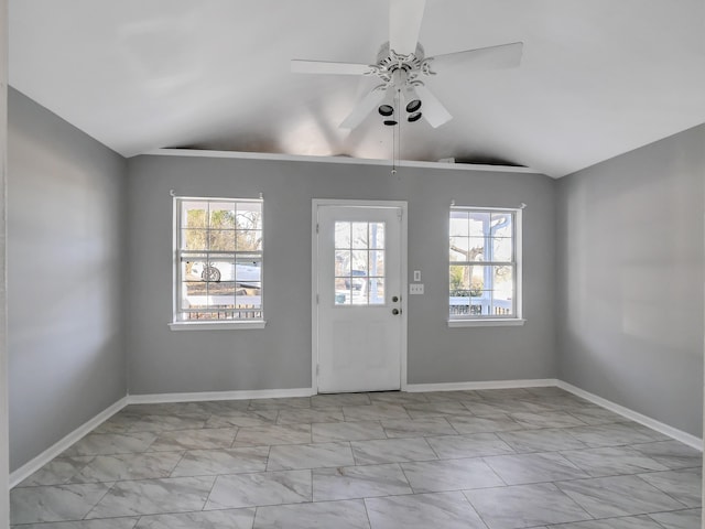 foyer with vaulted ceiling and ceiling fan