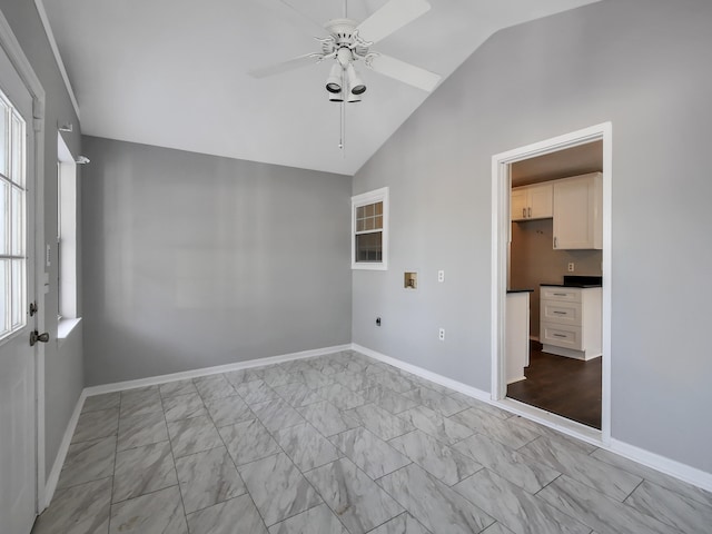 unfurnished room with lofted ceiling and ceiling fan