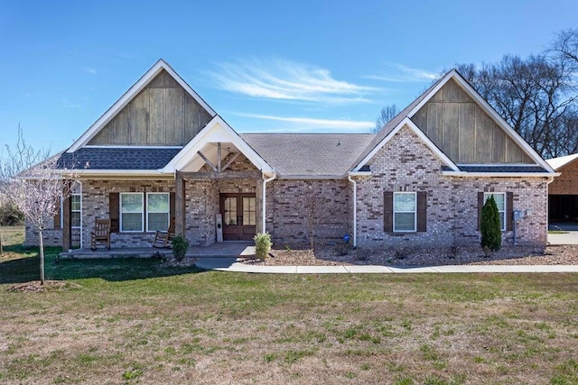 craftsman-style home with a front lawn