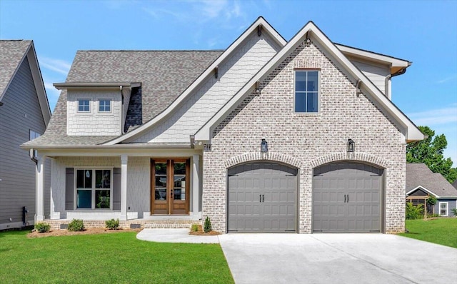 view of front facade featuring brick siding, a front lawn, roof with shingles, a garage, and driveway