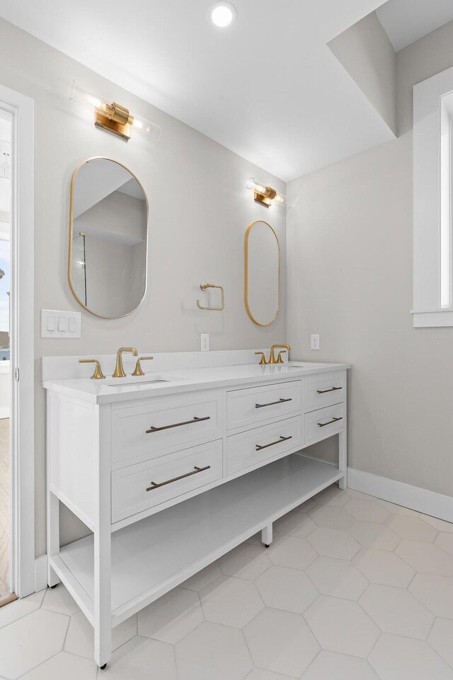 bathroom featuring tile patterned floors and vanity