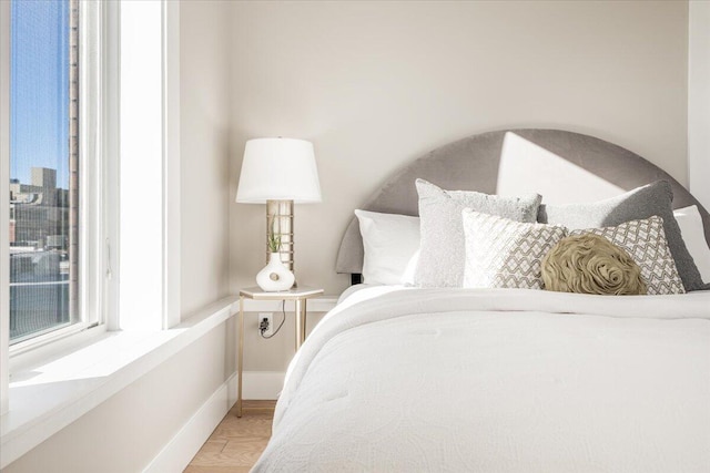 bedroom with light wood-type flooring