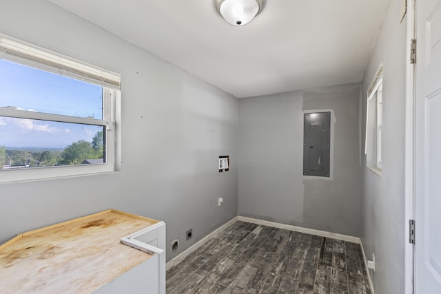 laundry area featuring electric panel, dark hardwood / wood-style floors, and hookup for an electric dryer