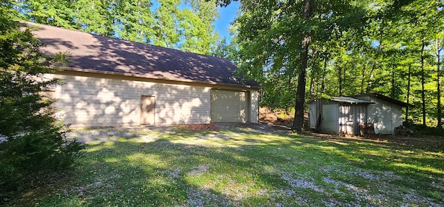 exterior space featuring a lawn and a shed