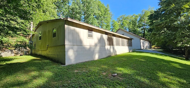 view of home's exterior featuring a lawn