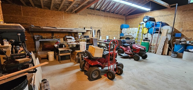 garage with a workshop area