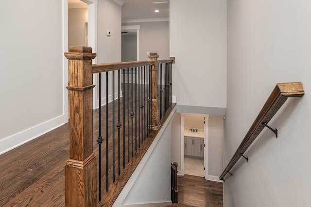 stairs featuring recessed lighting, baseboards, and wood finished floors