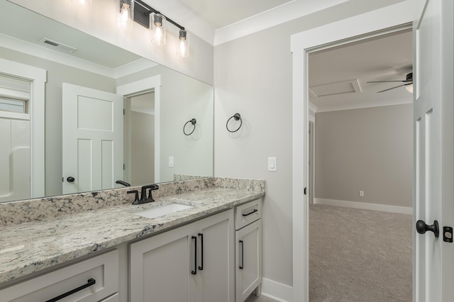 bathroom featuring vanity, ceiling fan, and ornamental molding