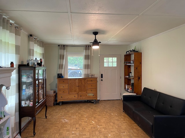 living room featuring light parquet flooring and ceiling fan