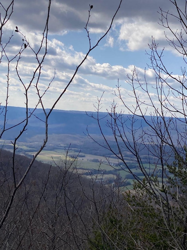 property view of mountains featuring a water view