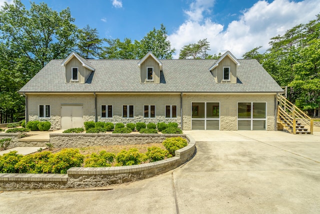 view of new england style home