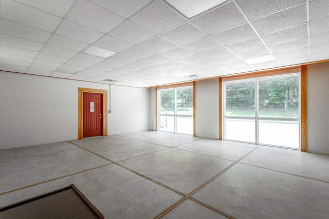 empty room with a paneled ceiling