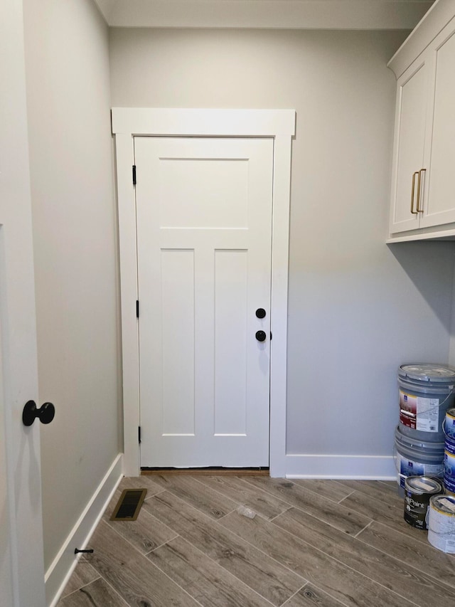 doorway to outside with light hardwood / wood-style floors