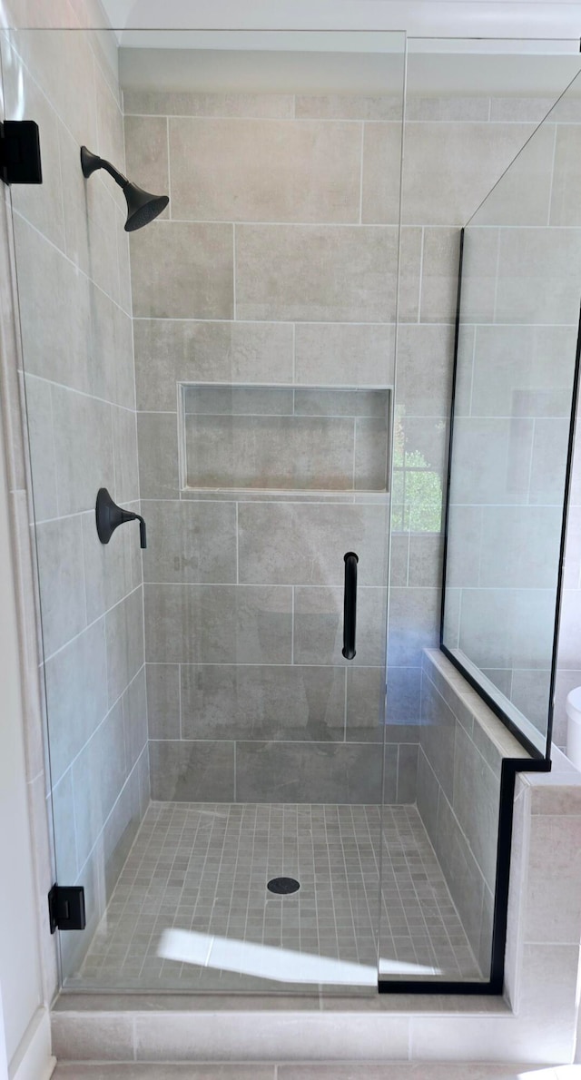 bathroom with an enclosed shower