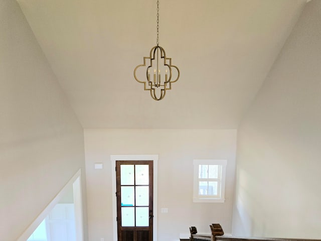 interior details featuring a notable chandelier