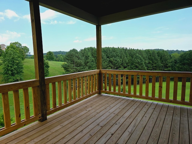 deck featuring a yard