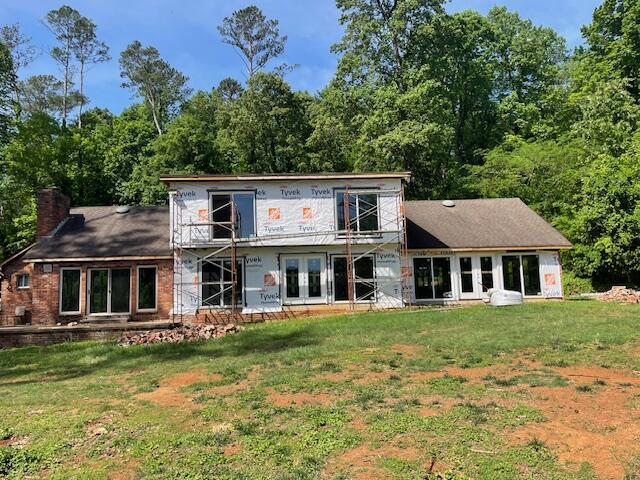 6591 Chipmunk Dr, Harrison, TN 37341 - rear view of property with a lawn, a chimney, and french doors