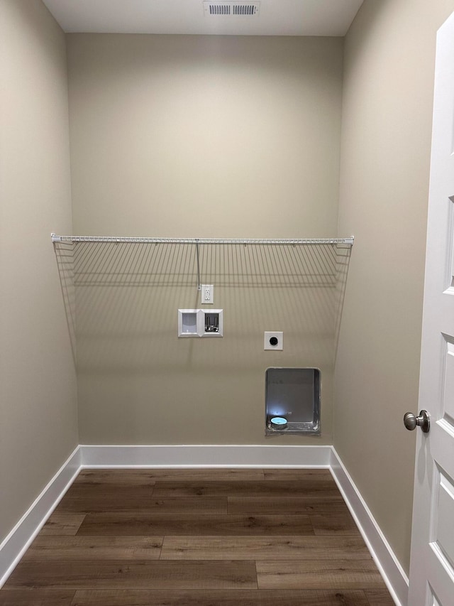 laundry area with washer hookup, hookup for an electric dryer, and dark hardwood / wood-style floors