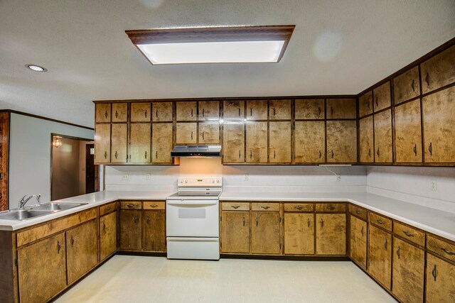 kitchen featuring kitchen peninsula, sink, and white range with electric cooktop