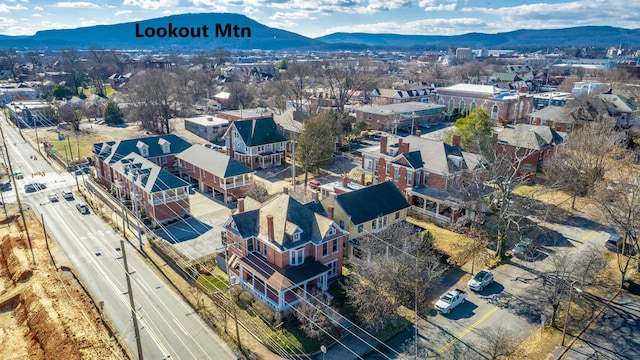 birds eye view of property with a mountain view