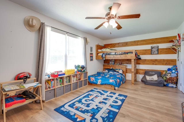 bedroom featuring ceiling fan and hardwood / wood-style flooring