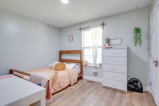 bedroom featuring light hardwood / wood-style flooring