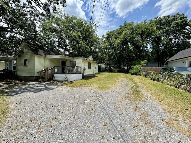 exterior space featuring a wooden deck