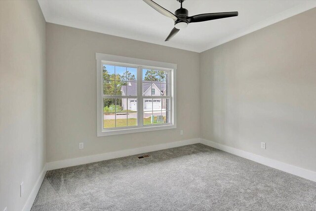 unfurnished room featuring carpet flooring and ceiling fan