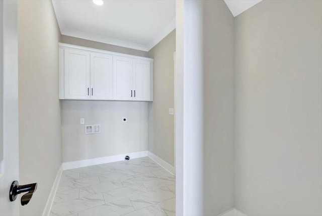 laundry area featuring ornamental molding, hookup for a washing machine, cabinets, and electric dryer hookup