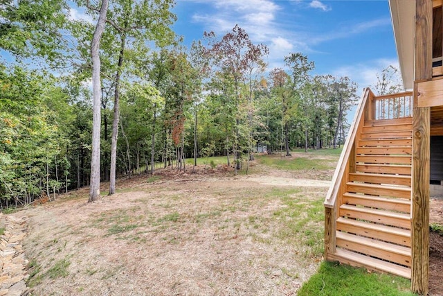 view of yard with a wooden deck