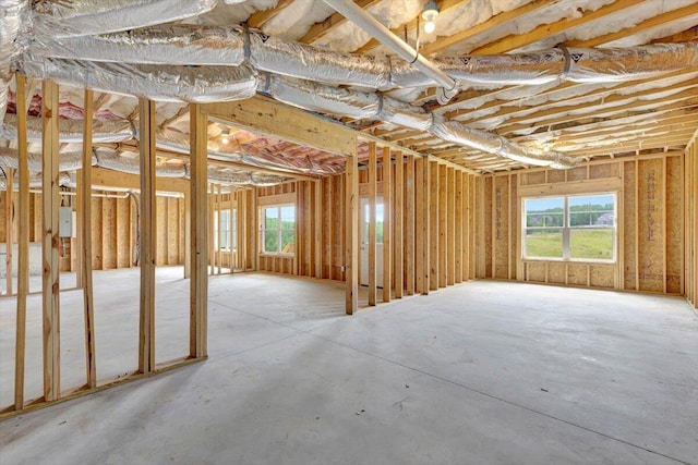 misc room with plenty of natural light and concrete floors