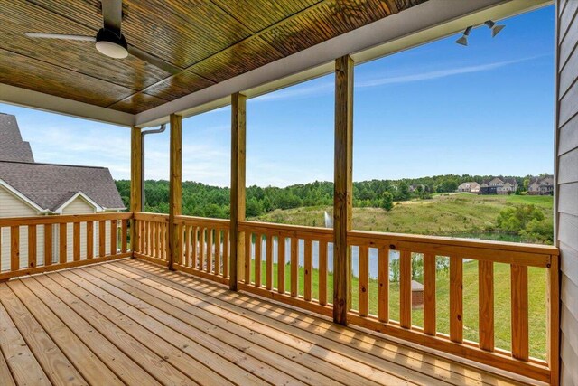 wooden terrace with ceiling fan