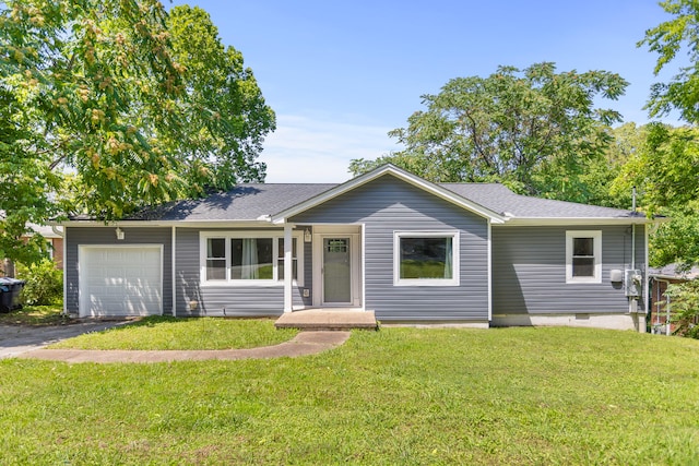 ranch-style home featuring a front lawn and a garage