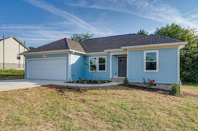 ranch-style home with a garage and a front lawn