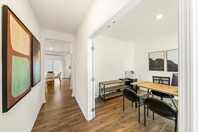 office area with dark hardwood / wood-style flooring