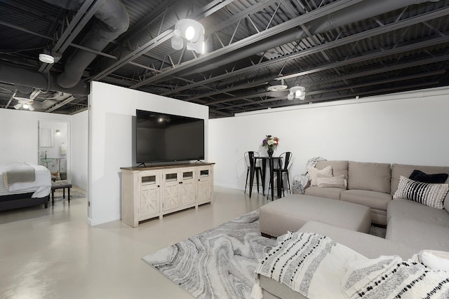 living room with concrete flooring