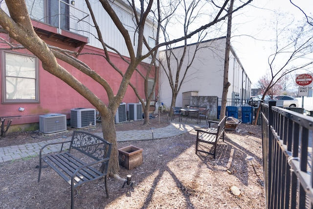 view of yard featuring a patio area and central AC