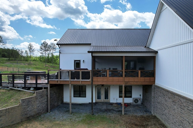 1033 SE Carter Rd, Old Fort, TN 37362 - rear view of property featuring metal roof and a deck