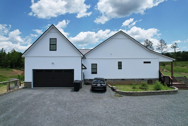 1033 SE Carter Rd, Old Fort, TN 37362 - view of home's exterior featuring driveway and a garage