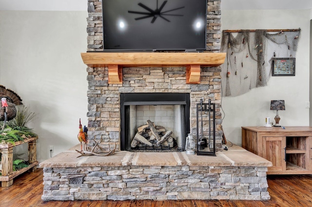1033 SE Carter Rd, Old Fort, TN 37362 - details featuring a fireplace and wood finished floors