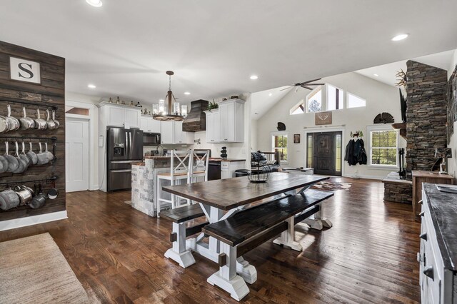 1033 SE Carter Rd, Old Fort, TN 37362 - dining room featuring ceiling fan with notable chandelier, dark wood-type flooring, and recessed lighting