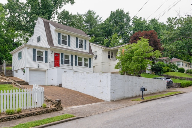 view of front of home with a garage