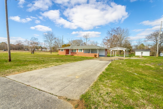 single story home with an outdoor structure, a garage, a front lawn, and a carport