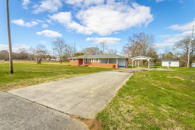 2237 Cloud Springs Rd, Rossville, GA 30741 - view of front of house featuring driveway, a front yard, and a carport