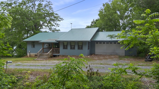 ranch-style house featuring a garage