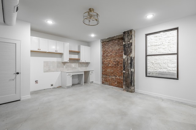 kitchen featuring white cabinetry